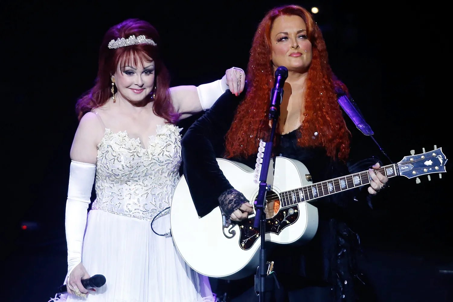 Naomi Judd and Wynonna Judd performing during their 'Girls Night Out' residency in Las Vegas on October 7, 2015.