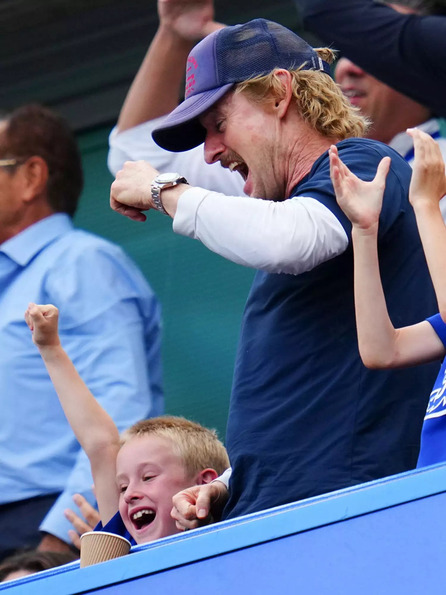 Owen Wilson celebrates the opening goal with his sons Robert Ford and Finn Lindqvist Chelsea v Tottenham Hotspur, Premier League, Football, Stamford Bridge, London, UK - 14 Aug 2022