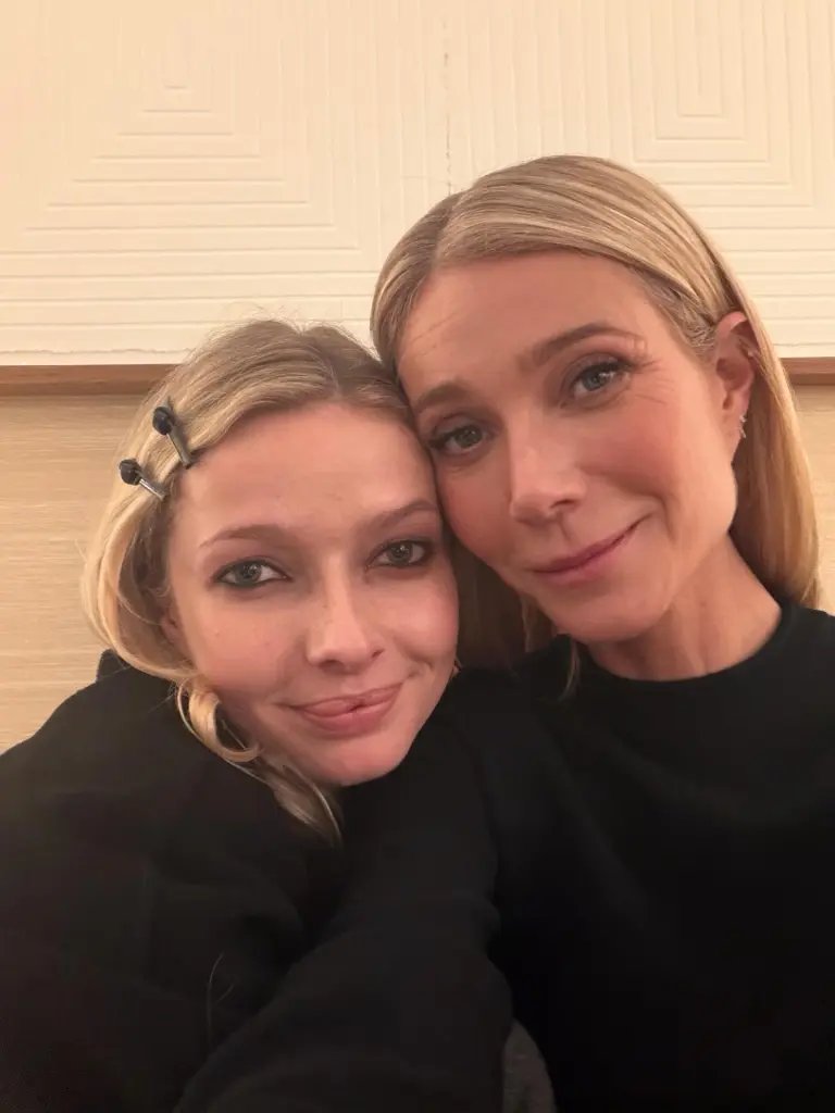 Gwyneth Paltrow and Apple Martin taking a selfie together.