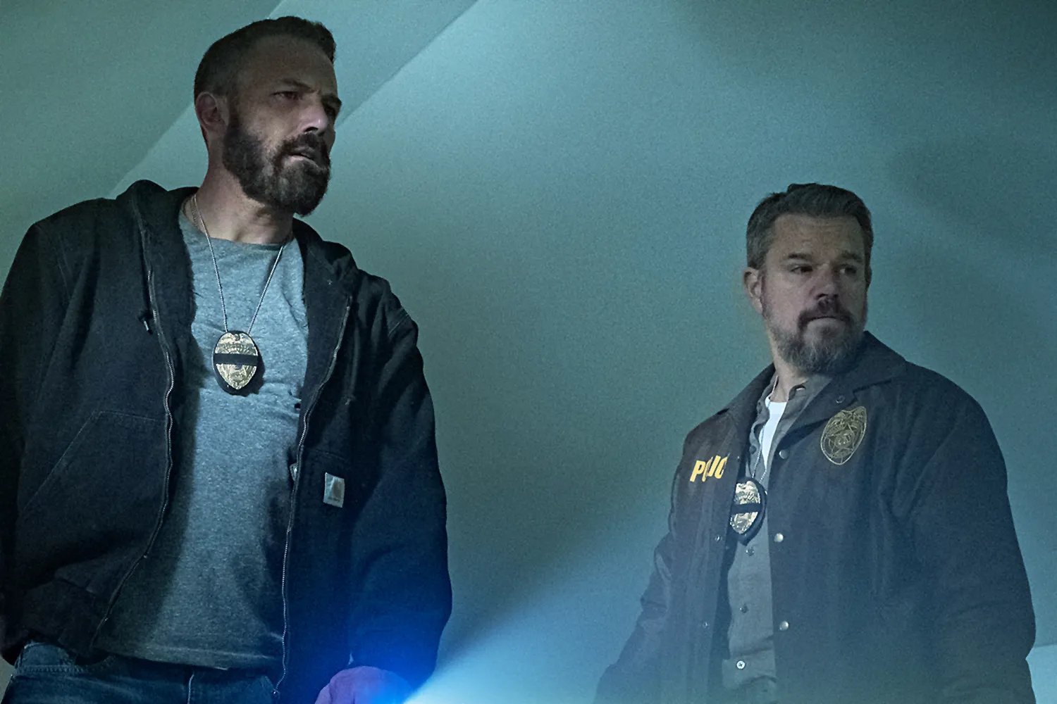 Ben Affleck as Detective Sergeant J.D. Byrne and Matt Damon as Lieutenant Dane Dumars in The Rip