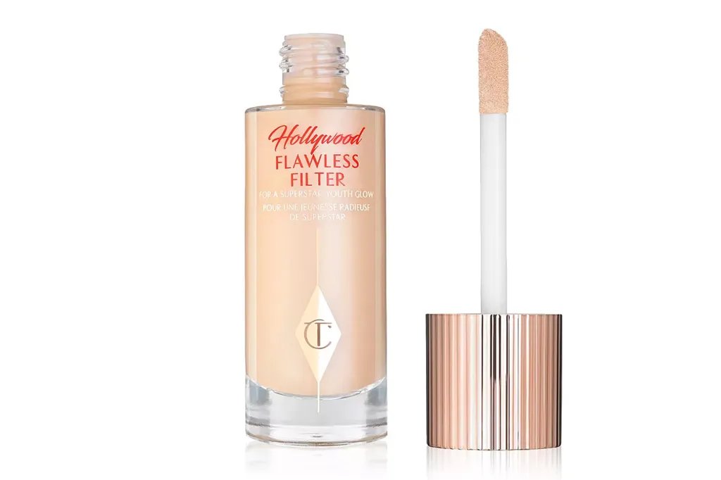 Charlotte Tilbury Hollywood Flawless Filter foundation in a glass bottle with an applicator wand.
