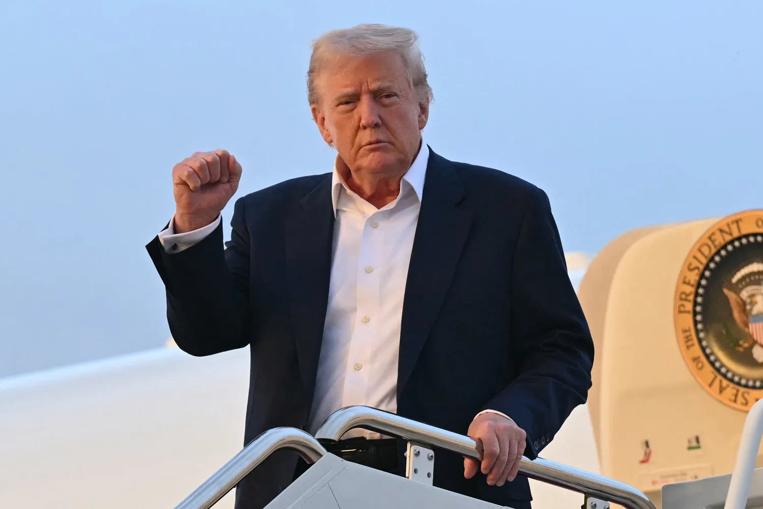 US President Donald Trump disembarks from Air Force One upon arrival at Joint Base Andrews in Maryland, May 4, 2025, as he returns to the White House after spending the weekend in Florida.