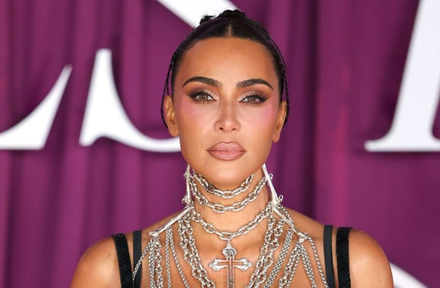 Kim Kardashian Embraces Retro Vibes with a Plunging Pin-Up Bra and Vintage '60s Hairstyle