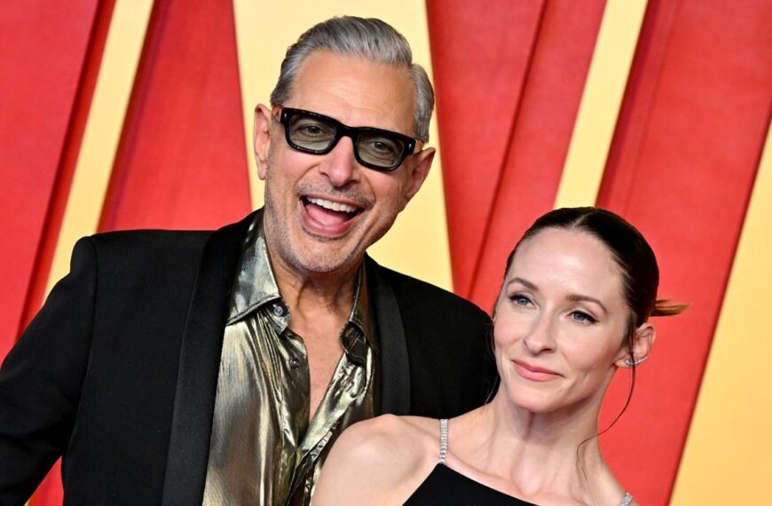 Emilie Livingston Stuns in a Chic LBD with a Bold Slit at Jeff Goldblum's Side
