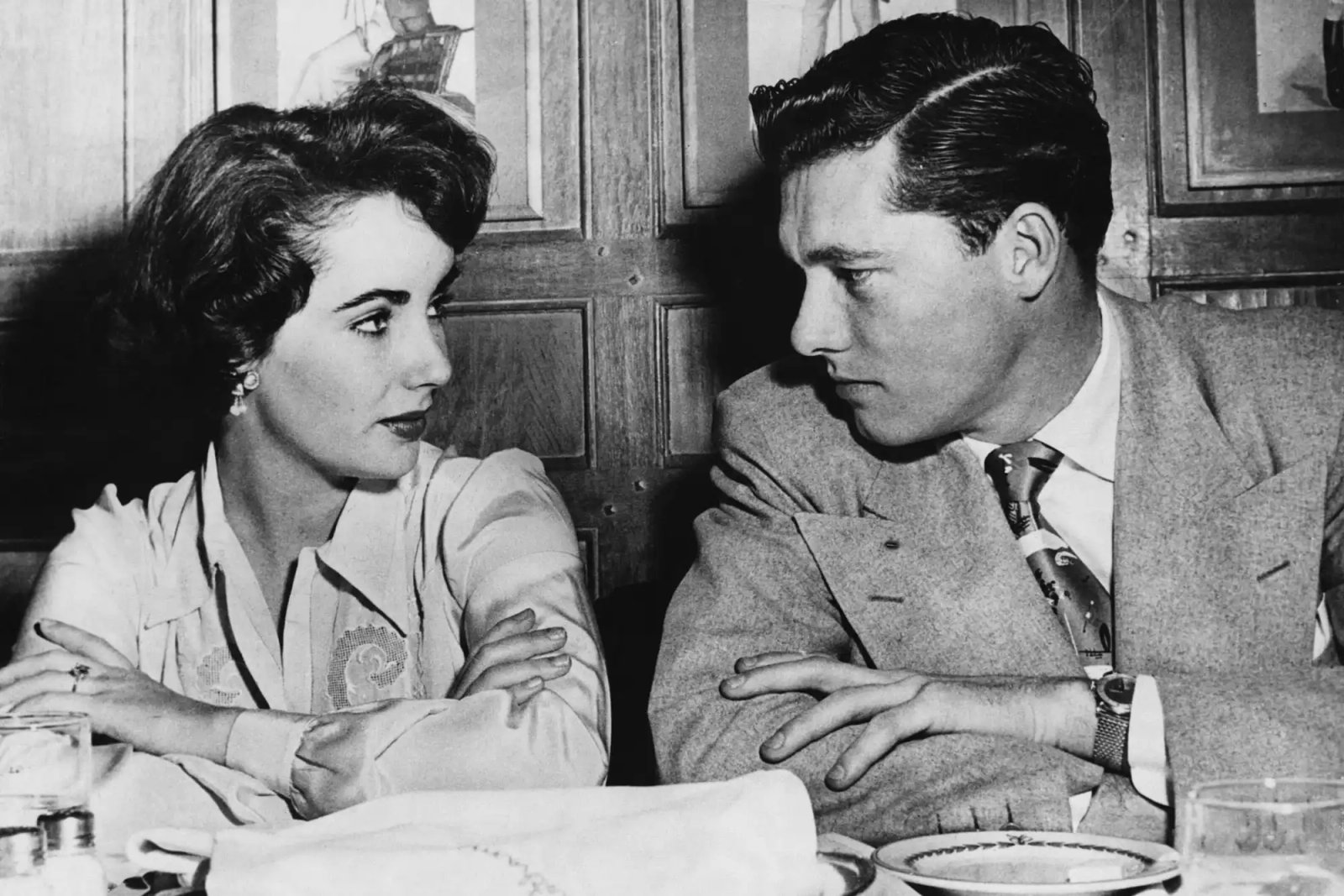 Actress Elizabeth Taylor and her fiancee, Nicky Hilton, son of the millionaire hotel magnate share a meal together.