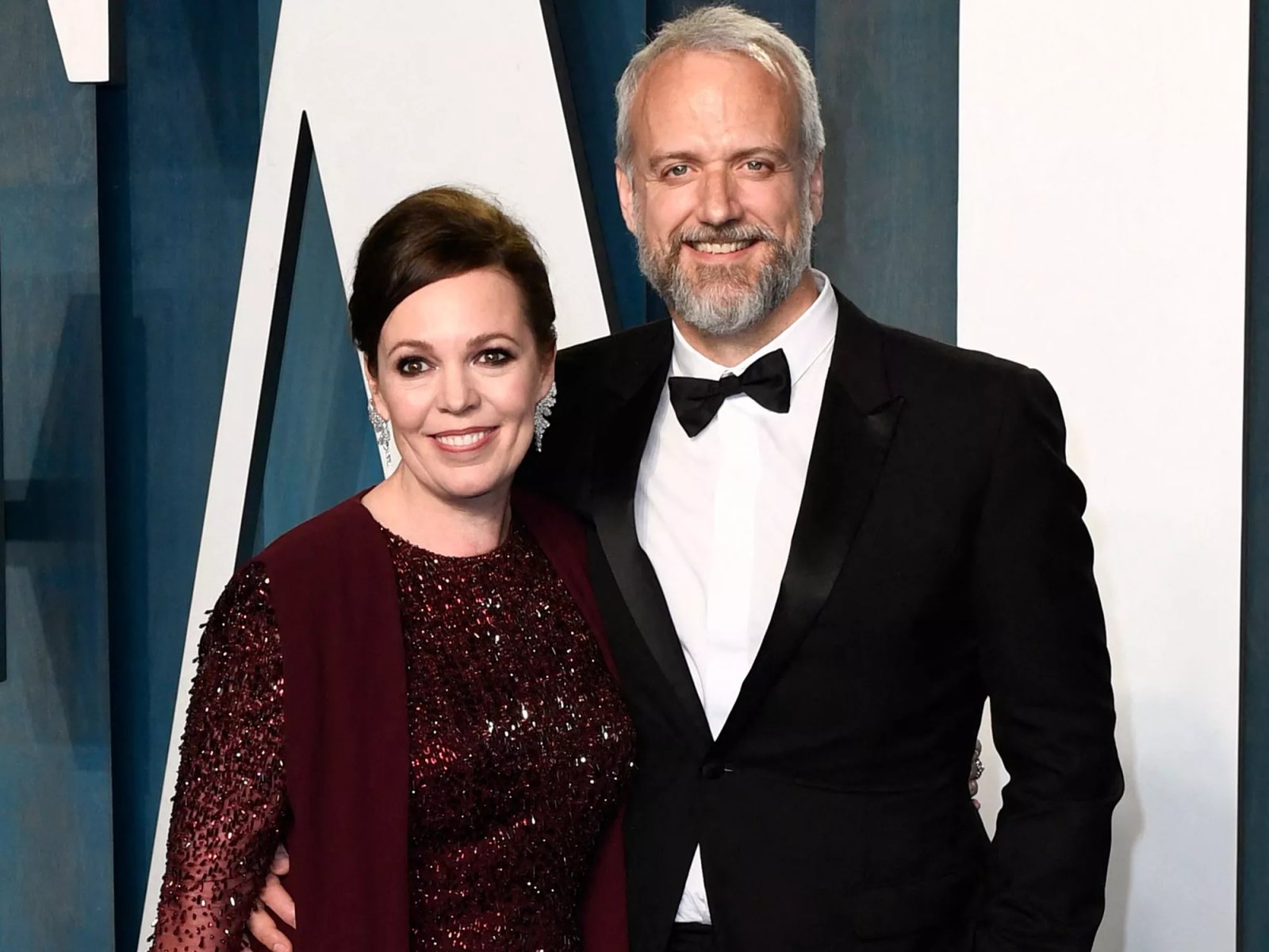 Olivia Colman and husband Ed Sinclair attend the 2022 Vanity Fair Oscar Party following the 94th Oscars on March 27, 2022.