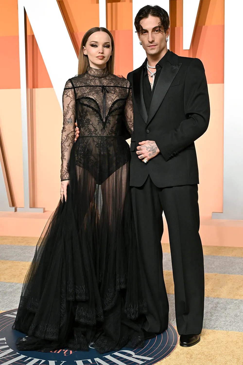 Dove Cameron and Damiano David attend the 2025 Vanity Fair Oscar Party Hosted By Radhika Jones at Wallis Annenberg Center for the Performing Arts on March 02, 2025 in Beverly Hills, California.