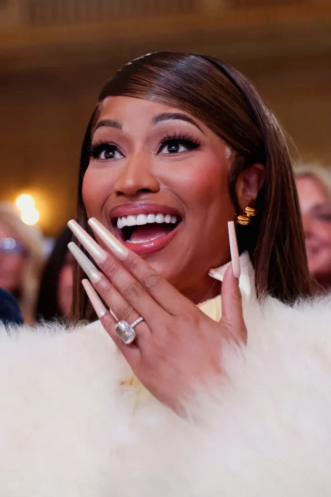 Musician Nicki Minaj reacts at the U.S. Treasury Department's Trump Accounts Summit.