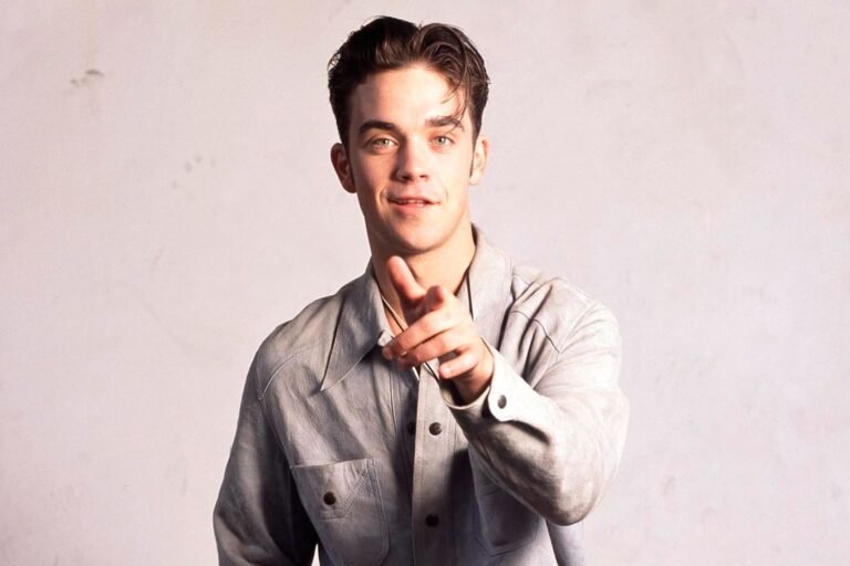 Robbie Williams Shares a Surprising Take on His Role as a Backing Dancer in Take That