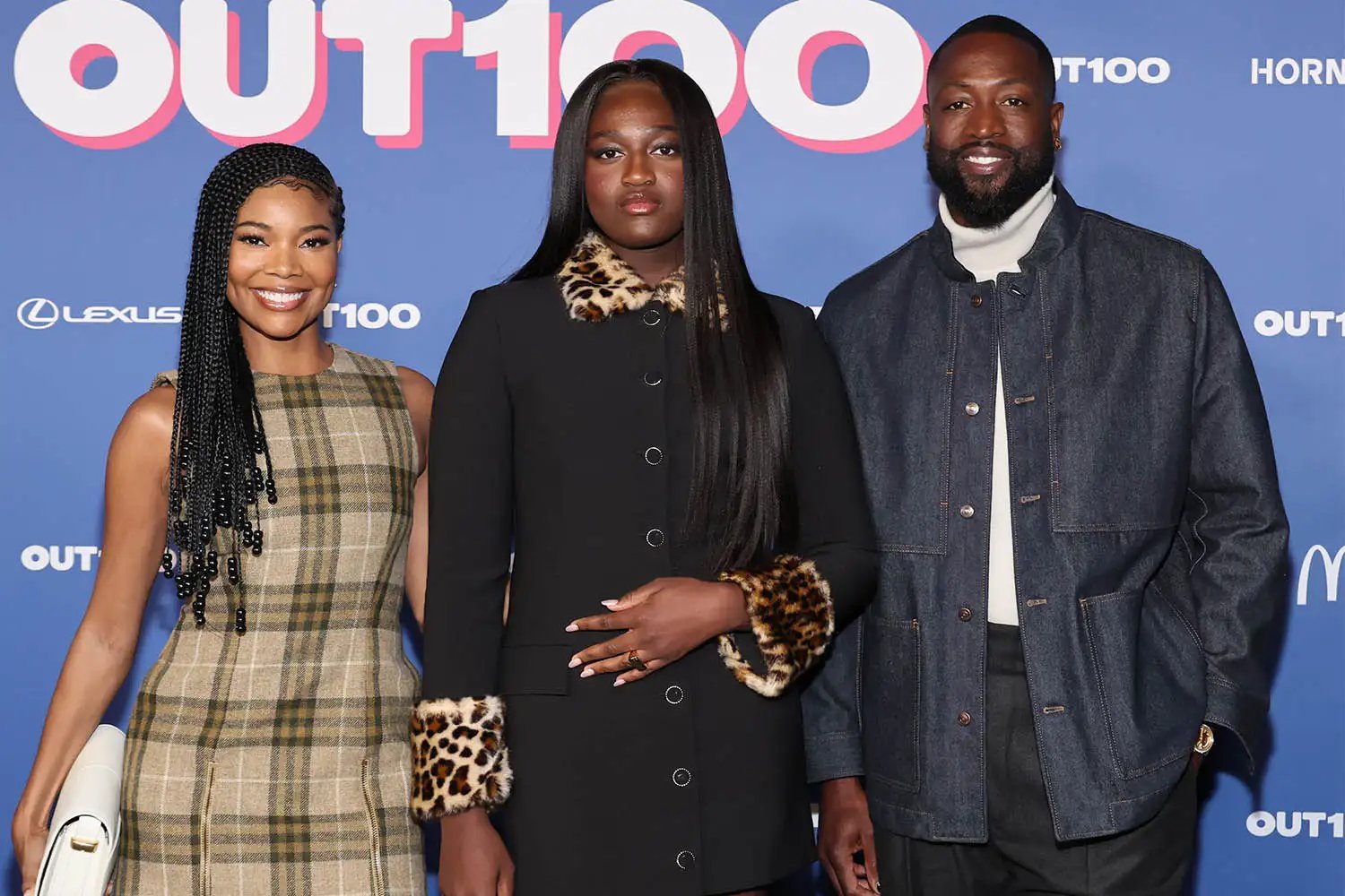 Gabrielle Union, Zaya Wade and Dwyane Wade attend the Out100 Celebration at NeueHouse Hollywood on December 11, 2024 in Hollywood, California.