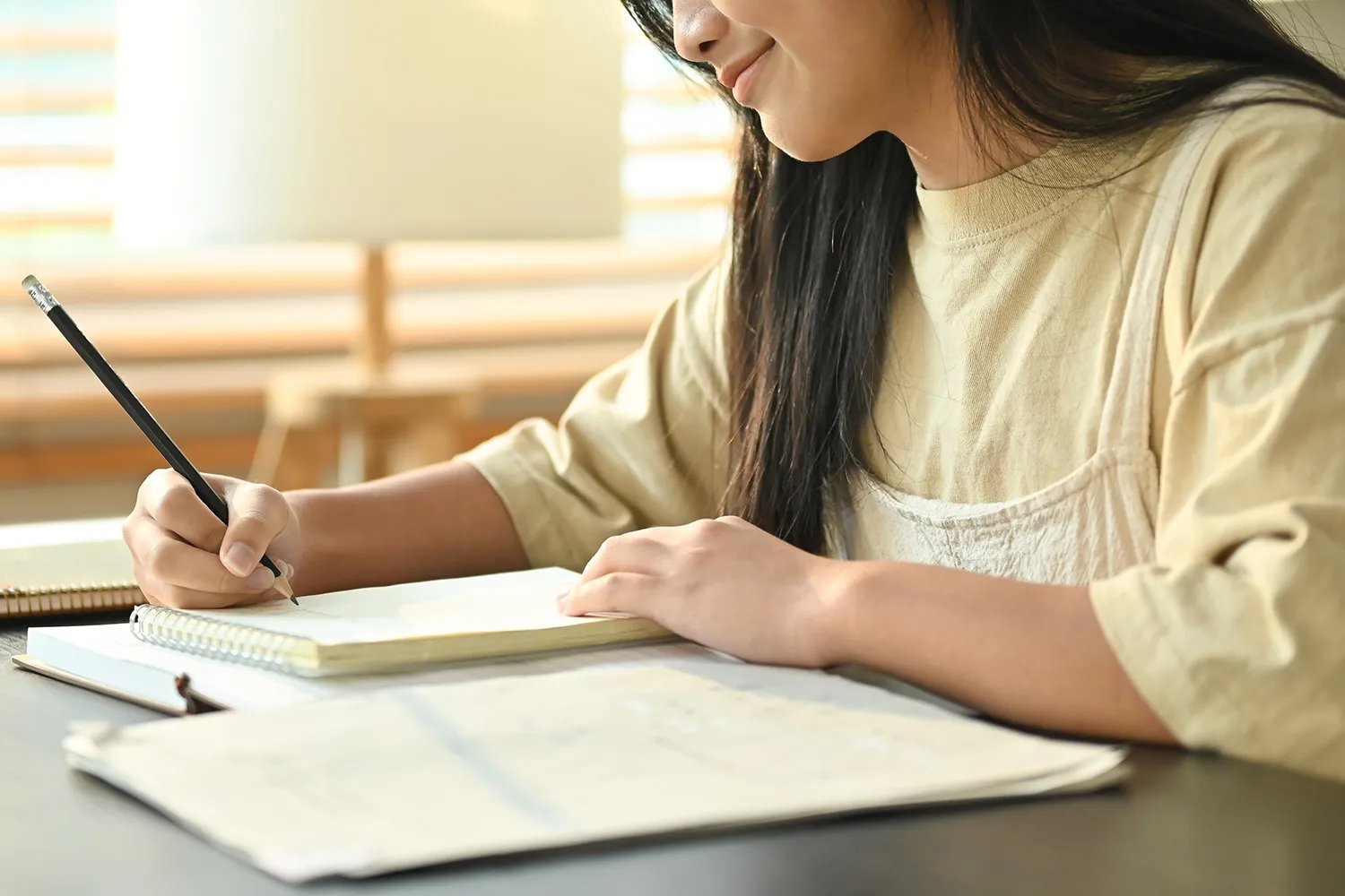 Stock photo of tween girl homeschooled.