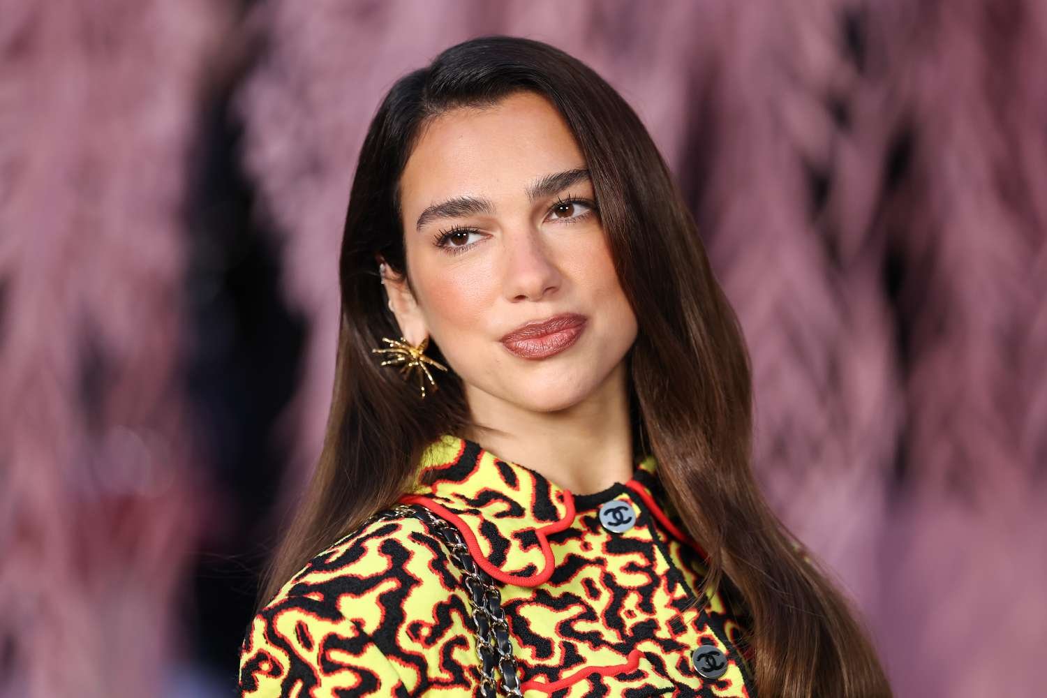 Dua Lipa Trades Her Signature Style for a Fun ‘80s-Inspired Look with a Millennial Side Part
