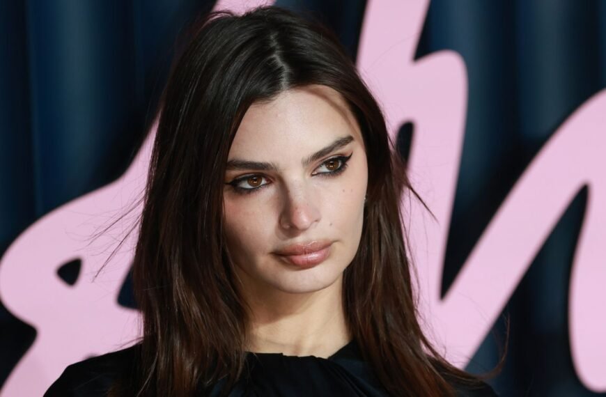 Emily Ratajkowski Dazzles in Berry Red Lace Lingerie and a Matching Garter Belt