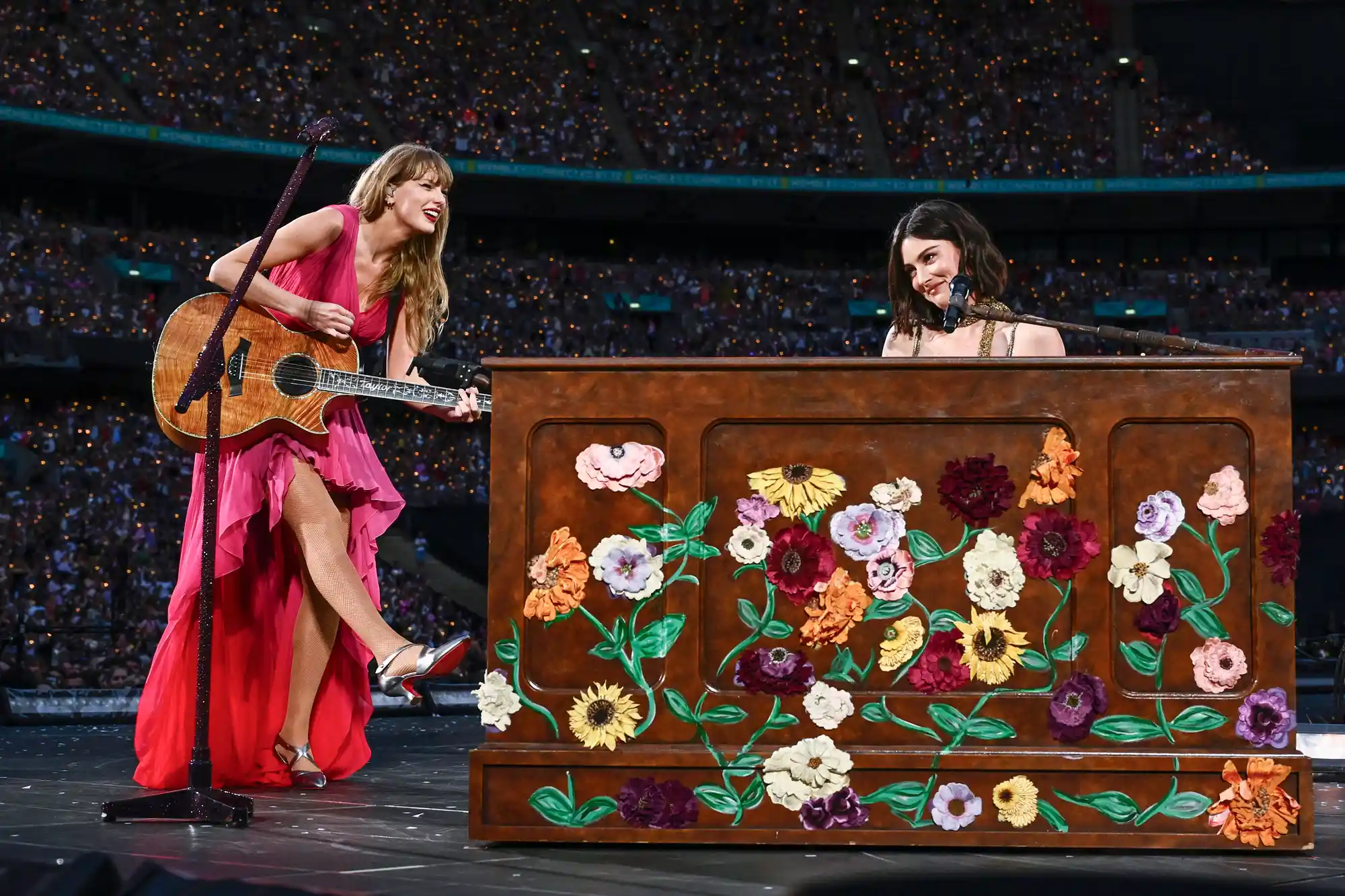 Taylor Swift and Gracie Abrams perform on stage during "Taylor Swift 