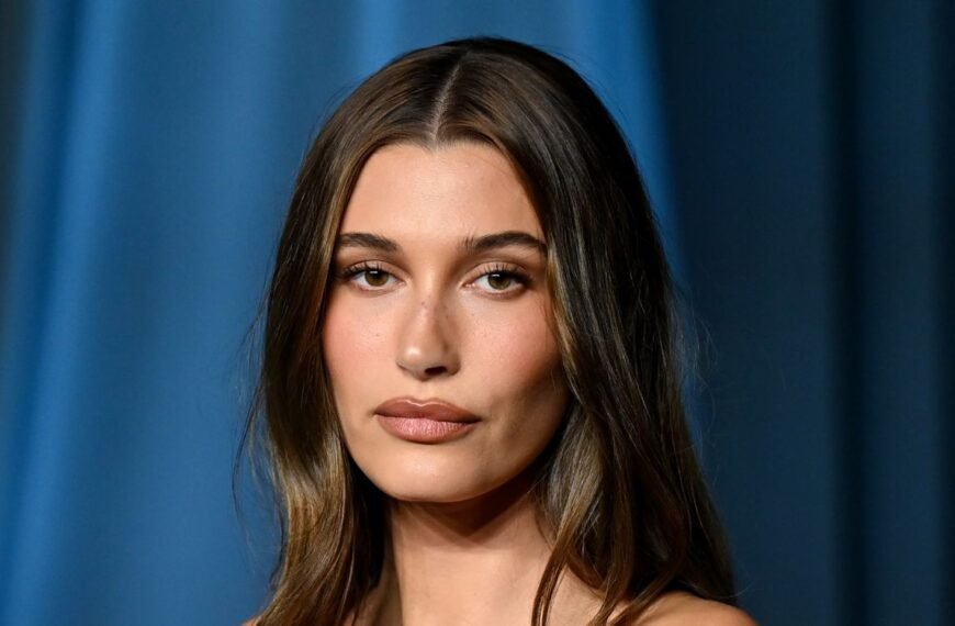 Hailey Bieber Shares a Natural Moment Wrapped in Her Bedsheets