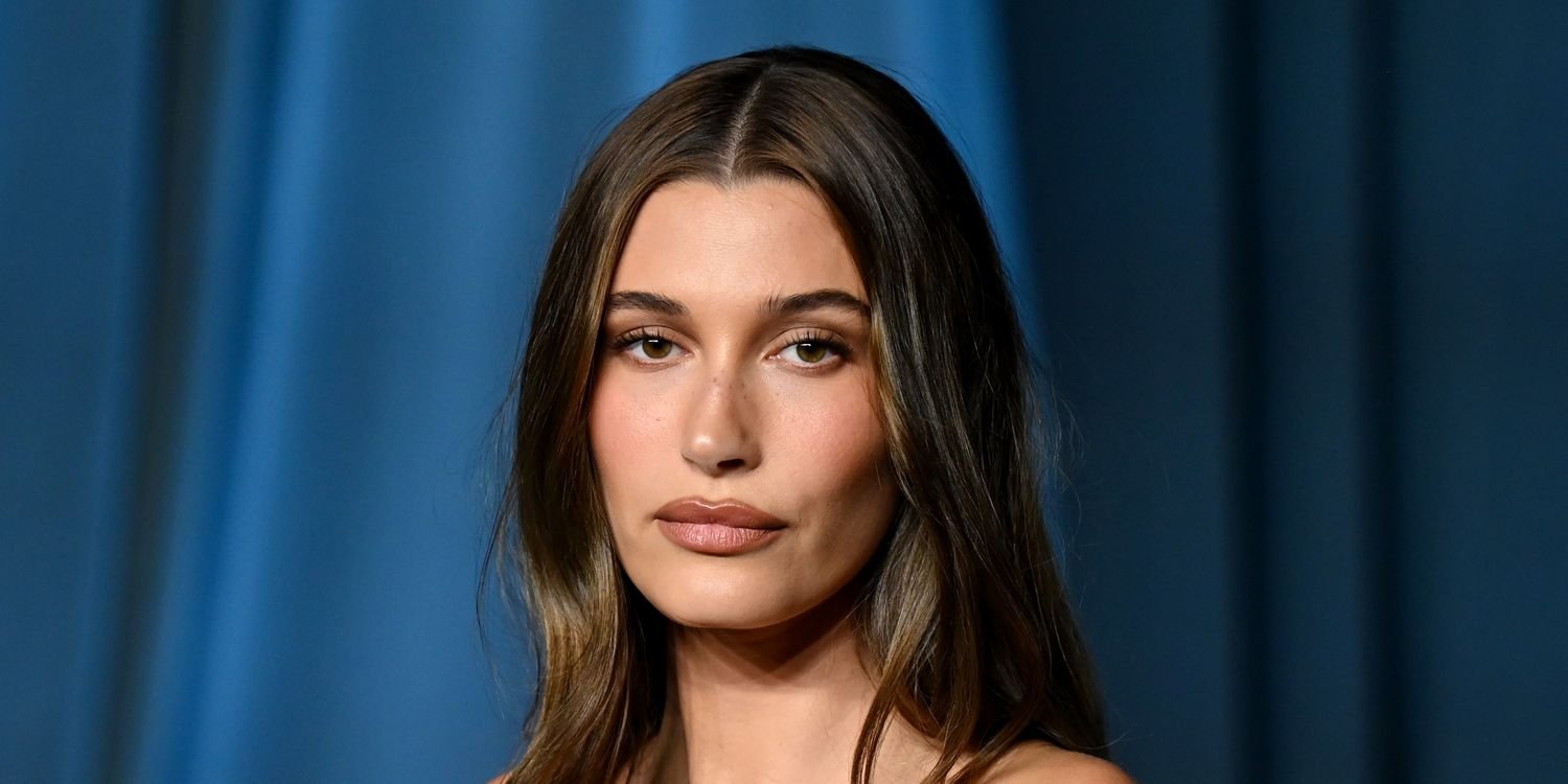 Hailey Bieber Shares a Natural Moment Wrapped in Her Bedsheets