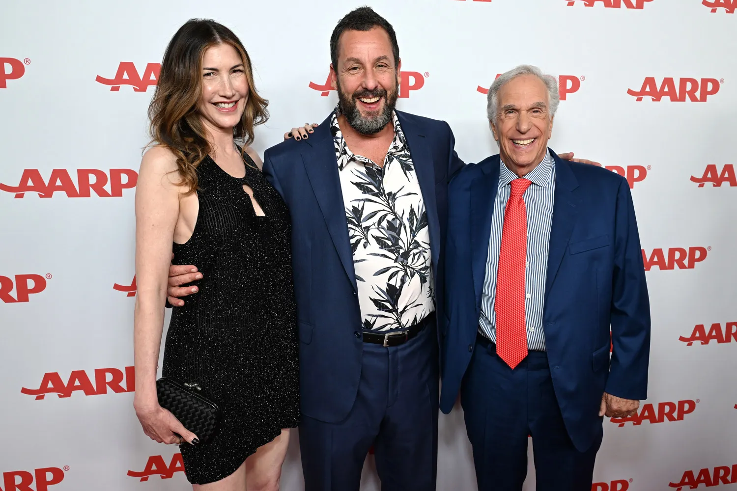 Jackie Sandler, Adam Sandler, and Henry Winkler attend the 2026 Annual Movies for Grownups Awards with AARP at Beverly Wilshire, A Four Seasons Hotel on January 10, 2026 in Beverly Hills, California.