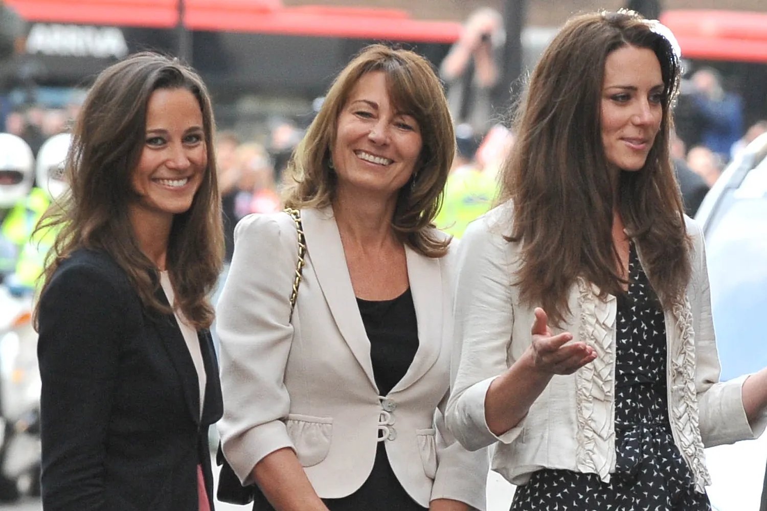 Catherine Middleton (R) is seen arriving with her mother Carole Middleton (M) and sister Pippa Middleton