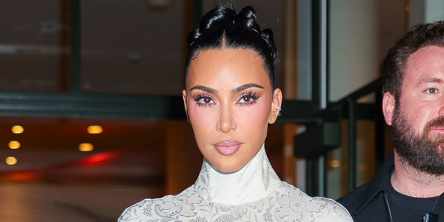 Kim Kardashian Stuns in a Shimmery Dress with a Bold Slit