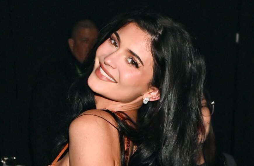 Kylie Jenner Stuns in a Deep Plunge Leather Dress While Teaming Up with Charli XCX