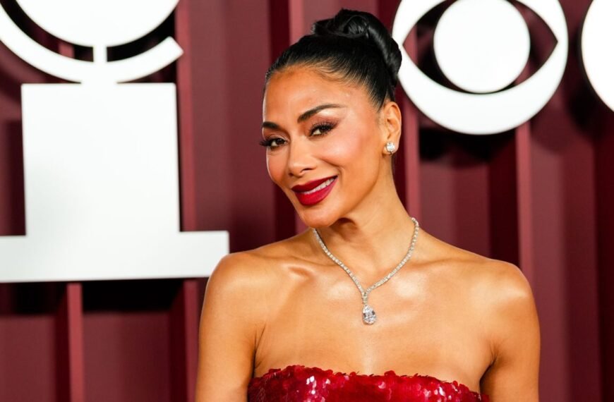 Nicole Scherzinger Enjoys a Day by the Water in a Stylish Blue Bikini with Her Fiancé