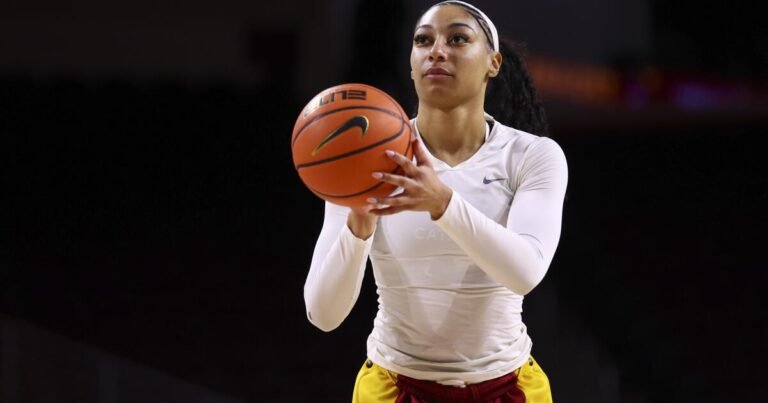 USC Women's Team Celebrates a Major Victory Against No. 8 Iowa