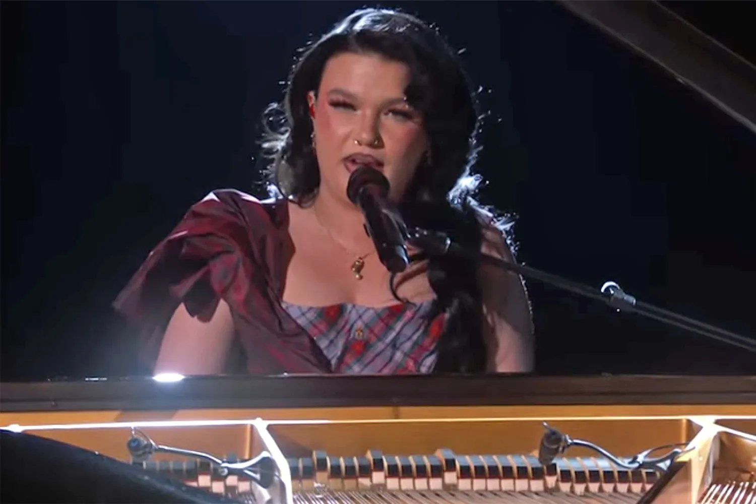 Lola Young performs during the 2026 Grammy Awards.