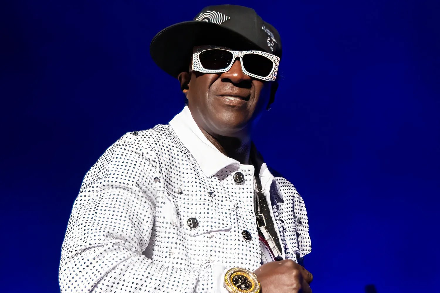 Flavor Flav speaks on stage at the Jelly Roll concert at The Fillmore on April 24, 2024 in Detroit, Michigan.