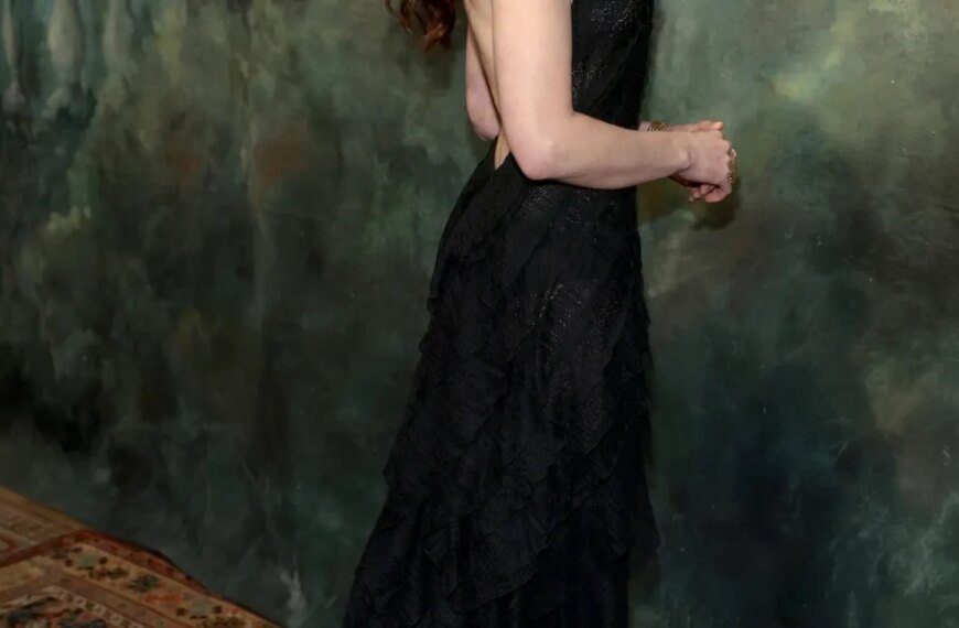 Anne Hathaway Radiates Timeless Beauty in a Semi-Sheer Dress at Ralph Lauren's New York Fashion Week Show