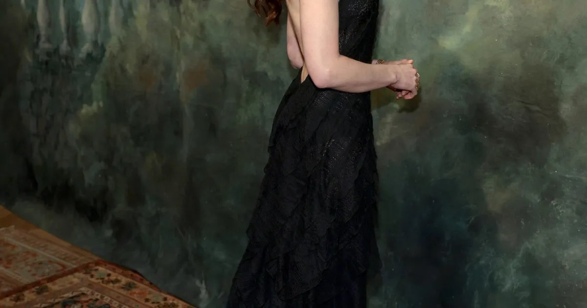 Anne Hathaway Radiates Timeless Beauty in a Semi-Sheer Dress at Ralph Lauren's New York Fashion Week Show