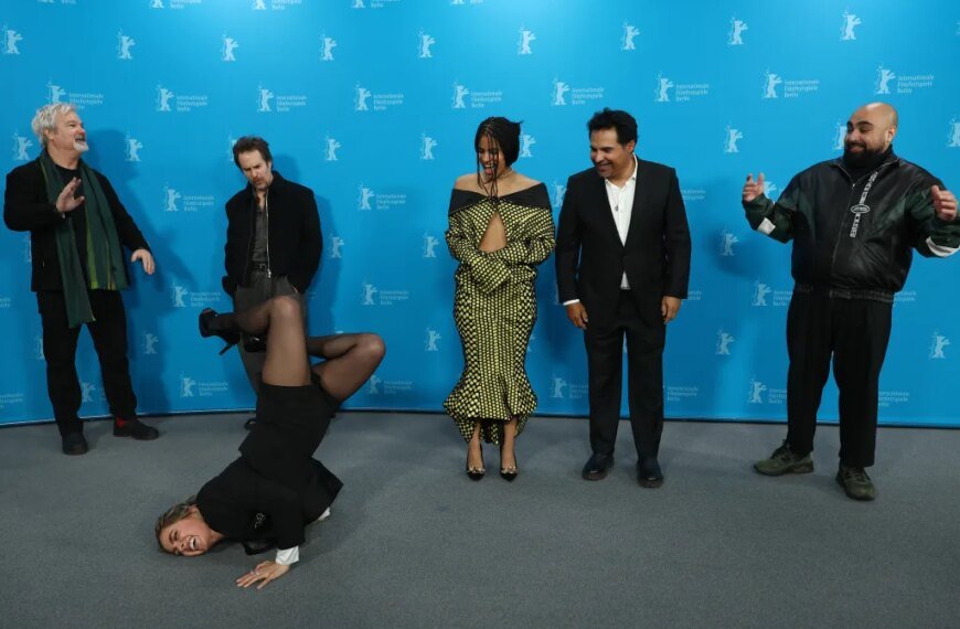 Haley Lu Richardson and Michael Peña Bring Fun to Berlin with Headstands and High Kicks