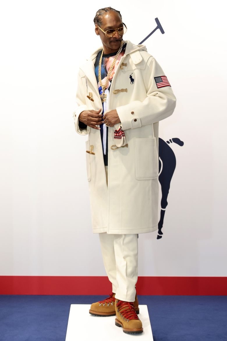 Pictured in a chic white duffel coat also by official Team USA designer Ralph Lauren.