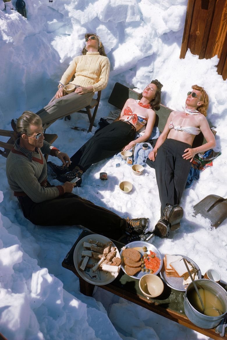 Sunbathing skiers after a meal in Sun Valley, Idaho in 1946.