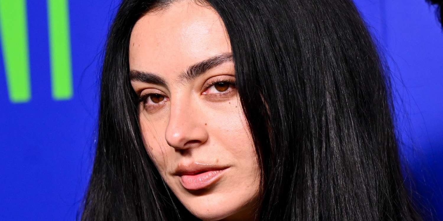 Charli XCX Styles a Leather Jacket as a Minidress, Pairing It with Zippered Thigh-High Boots