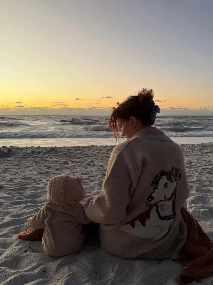 Millie Bobby Brown and her baby daughter in a rare photo of her 22nd birthday.