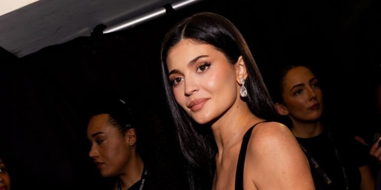 Kylie Jenner Strikes a Stylish Pose in a Vintage Animal Print Bikini and Sparkling Earrings