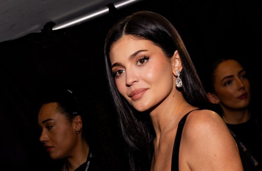 Kylie Jenner Strikes a Stylish Pose in a Vintage Animal Print Bikini and Sparkling Earrings