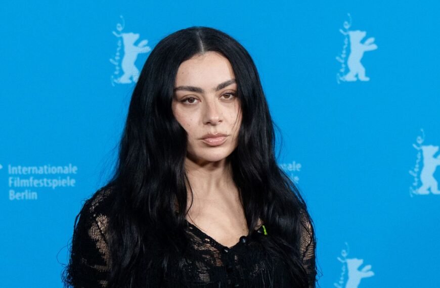 Charli XCX's Sheer Black Knit Minidress: A Gothic Look That's All About Edgy Style