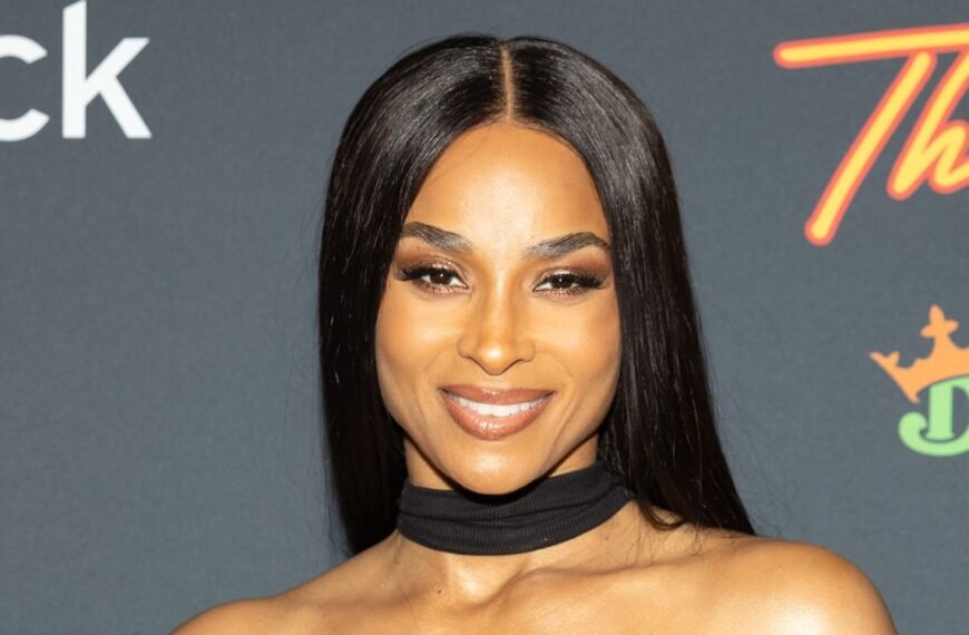 Ciara Styles Ruffled Lace Bloomers and a Chic Shoulder-Baring Top with Stunning 6-Inch Boots