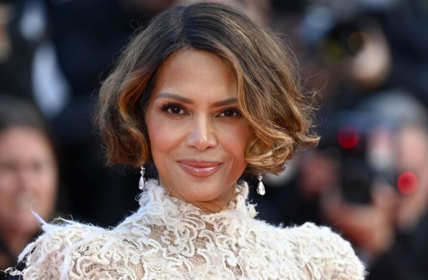 Halle Berry Stuns in a Stylish Latex Skirt and Eye-Catching Blue Blouse