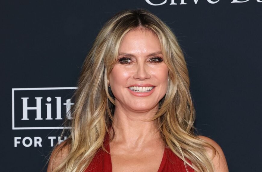 Heidi Klum Spotted Dancing in a Chic Chocolate Brown Bikini and Fun Straw Hat