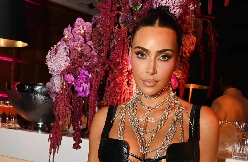 Kim Kardashian Rocks a Stylish Leather Bra Top with a Chic Matching Coat