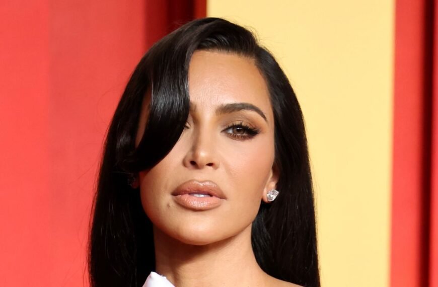 Kim Kardashian Shares a Casual Workout Look with a Towel and NikeSkims Leggings