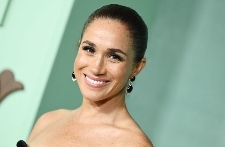 Meghan Markle Dazzles in a Burgundy Slip Dress and a Stunning $18,700 Necklace at a Celebration