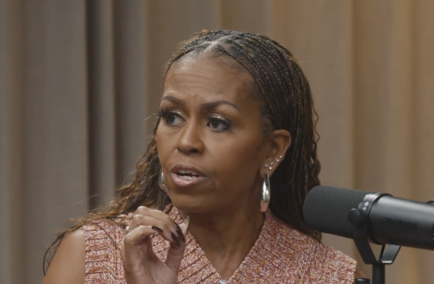 Michelle Obama Stuns in a Chic Cropped Sweater Vest and Statement Hoop Earrings