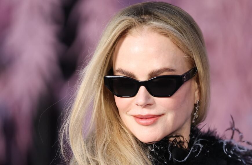 Nicole Kidman Stuns in a Fishnet Bodysuit with Playful Red Pigtails