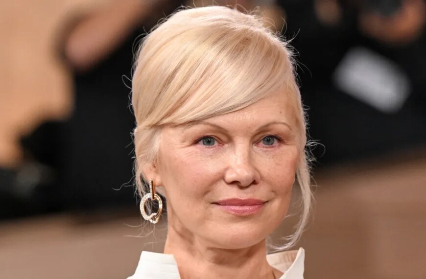 Pamela Anderson’s NYFW Outfit Showcases the Comfy Anti-Jeans Trend Everyone is Loving