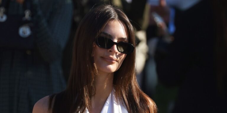 Emily Ratajkowski Smoothly Deals with a Wardrobe Slip After Her Knotted Backless Top Breaks