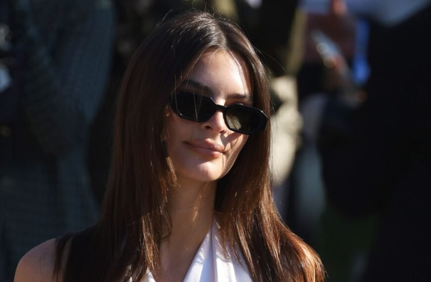 Emily Ratajkowski Smoothly Deals with a Wardrobe Slip After Her Knotted Backless Top Breaks