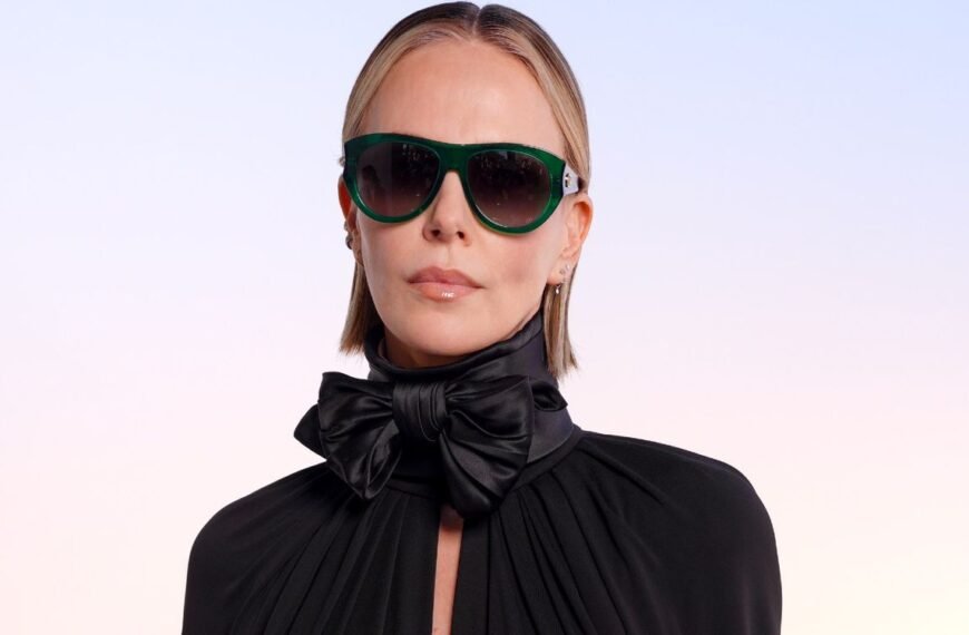 Charlize Theron Stuns in a Micro Miniskirt and Thigh-High Stockings at Dior's Paris Fashion Week Show